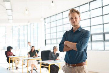 Design, confidence and portrait of man in coworking space with smile, leadership or pride in office. Happy, face and creative professional with arms crossed in project development at digital agency