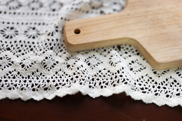 a wooden plate,cutting board,on a table