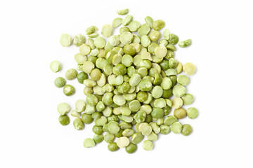 Split green peas pile on white background. Dry peas grains. Top view