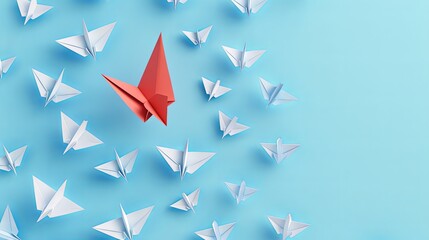 A red paper airplane stands out among white ones, soaring in a new path against a blue backdrop