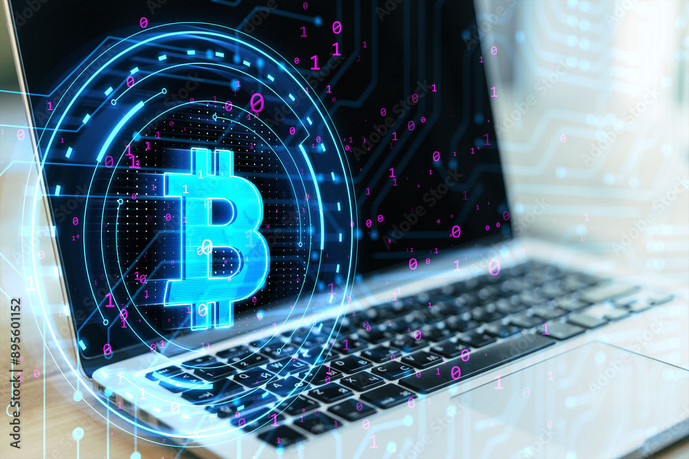 Poster close up of laptop with digital bitcoin sign on blurry background. digital banking, technology and c