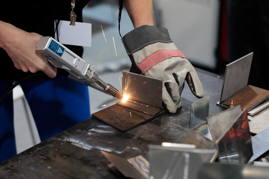 young female welder working