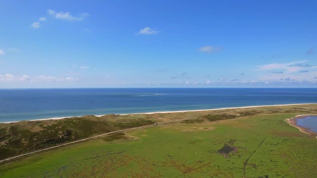 Island of Sylt - Lister Ellenbogen - 180 degree rotating aerial view from the sea to the bay.