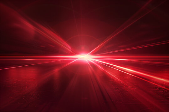 Red laser beams on black background like shooting future rays. Bright light shining through the darkness.
