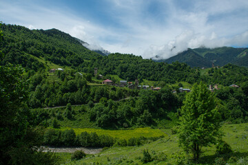 Mestia town in Georgia.
The medieval Svan Towers is a traditional fortified residence in Mestia, Georgia. Svan towers and structures surrounded by green colors.