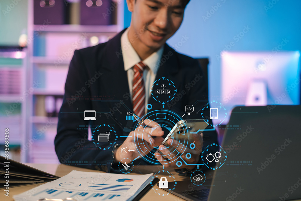 Wall mural person using smartphone with sdk icon on virtual screen. software development kit programming langua