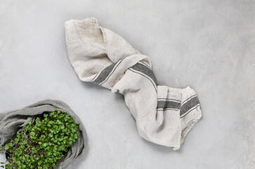 Linen Kitchen Towel with Fresh Microgreens on Marble Surface