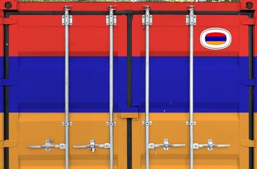 Armenia flag depicted on metal doors of shipping cargo container outdoors in docks area close up
