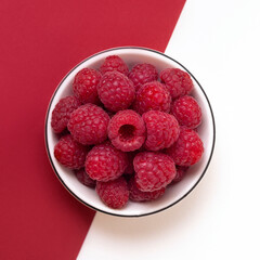 fresh raspberries background, red ripe raspberries on a plate