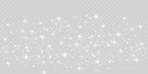 The dust sparks and white stars shine with special light. sparkles on a transparent background. Christmas light effect. Sparkling magical dust particles.