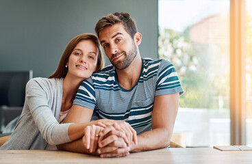 Portrait, couple and hug in home for marriage, together and morning in living room for bonding. Love, support and man with woman for trust, care and security for relationship in house or apartment