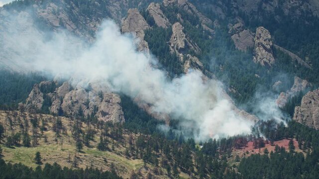 Fire Retardant Surrounding Green Mountain Fire in Boulder, Colorado, Wildfire in Hot Summer Heat, Flames from Dinosaur Fire