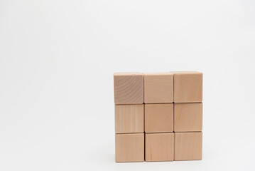 Wooden Blocks Arranged In Ascending Order On White Background