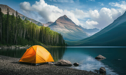 tent on the lake with mountains in the background