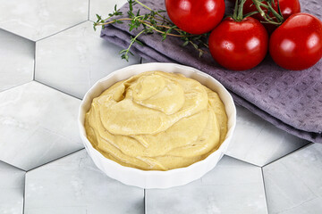 Dijon mustard sauce in the bowl