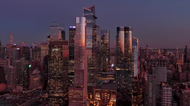 Aerial view of Hudson Yards skyscrapers in New York City at sunset.
