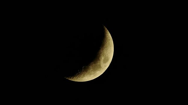 Astronomical beauty in a photo of a crescent moon in the night sky with clear detail