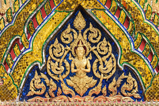 Colourful wall decorations in Wat Phra Kaew.