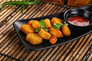 Crispy golden choclen nuggets with sauce