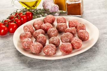 Uncooked raw beef meatball minced