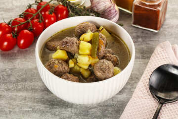 Soup with meatball and potato