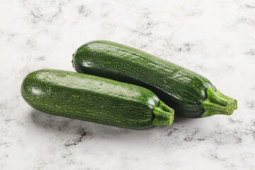 Raw green ripe zucchini vegetable
