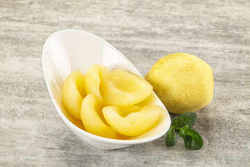 Canned yellow pear with syrup