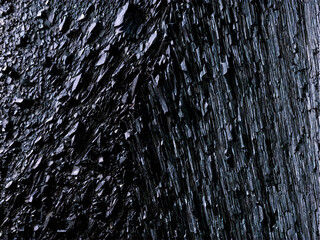 Argillite A dark argillite with a smooth slate like texture floating and lit to show