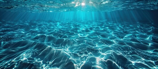 Naklejka premium Sunlight Dappling Through Turquoise Water