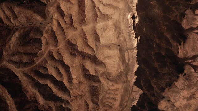 Top down aerial view of textures and patterns of Death Valley national park in Mojave desert, USA
