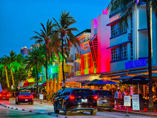 Miami Beach, Florida - July 8, 2024: Vibrant nightlife on Ocean Drive in South Beach, Miami