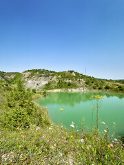 Naklejka premium A wonderful landscape in the Carpathian mountains with a view of the lake between the rocks in sunny weather
