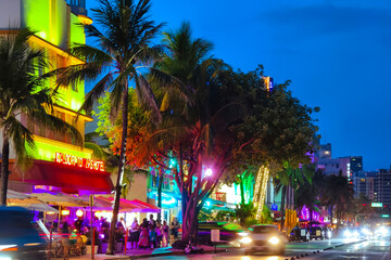 Miami Beach, Florida - July 8, 2024: bustling nightlife scenes at Ocean Drive in South Beach, showcasing urban vibrancy and lively atmosphere.