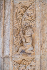 Naked cherub, cloister of the Monastery of San Juan de los Reyes, Toledo, Castilla-La Mancha, Spain