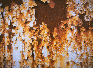 Texture of a turquoise rusty metal fence. Old grunge surface concept.