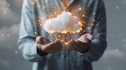 A person holds a glowing cloud in their hands, symbolizing creativity, innovation, and the interplay between technology and imagination.