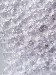 Bubble wrap is a lightweight and flexible packaging material commonly used to cushion fragile items during shipping