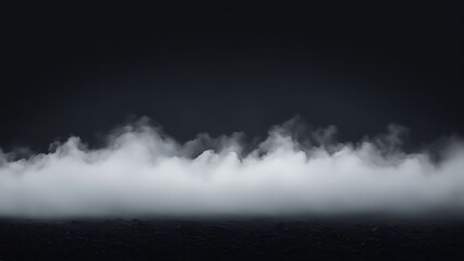 Obraz premium Dark and moody landscape with low-lying clouds over a mountainous terrain. Dramatic sky and misty atmosphere. Design for wallpaper, poster, print and banner