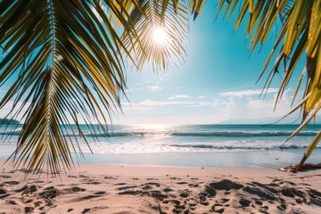 Fototapeta premium Tropical beach paradise with palm leaves, sunlit sand, and ocean waves, perfect for summer vacation, travel
