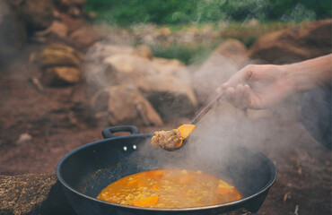 Cook outdoors amidst nature