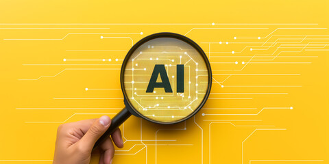 Businessman holding magnifying glass showing ai sign on yellow background with printed circuit board tracks - Powered by Adobe