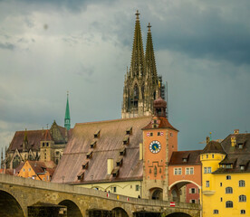 View of the medieval old town of Regensburg with the ancient bridge over the Danube in the foreground and the gothic cathedral in the background. regensburg, Upper Palatinate, Bavaria, Germany