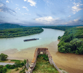 The Maiden tower of the Devin Castle ruins overlooking the confluence of the Danube and Morava...