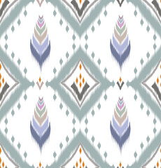 Ikat paisley linen textures.seamless ikat paisley patters. Ikat tribal Indian seamless pattern. Ethnic Aztec fabric carpet mandala ornament native boho chevron textile.