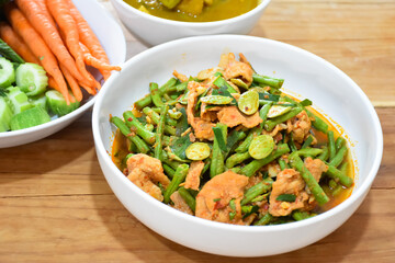 Thai food, stir-fried pork with curry paste and yardlong beans, very spicy flavor.