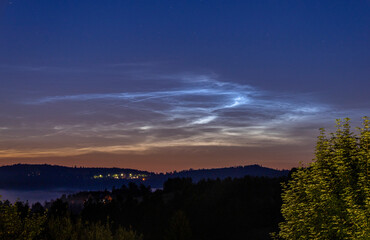 Silver clouds on the horizon after sunset