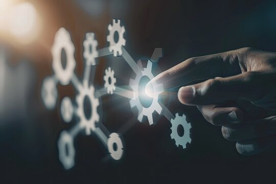 Finger directing towards digital cogwheel symbols, illustrating concepts of system integration, technology adoption, interactive interfaces, and process optimization.