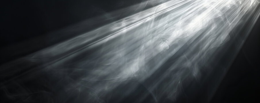 Light rays shining through smoke in a