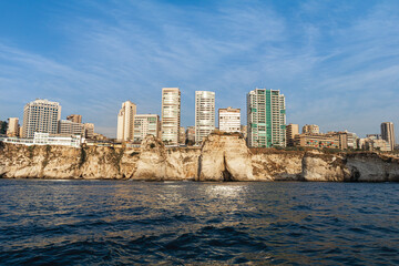 Beirut skyline with modern buildings atop Rawshe Rocks and the Mediterranean Sea