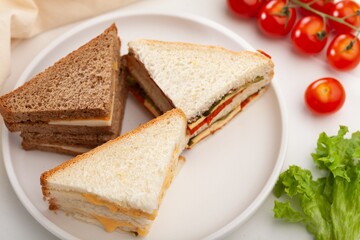Fresh tasty sandwiches with vegetable on wooden chopping board